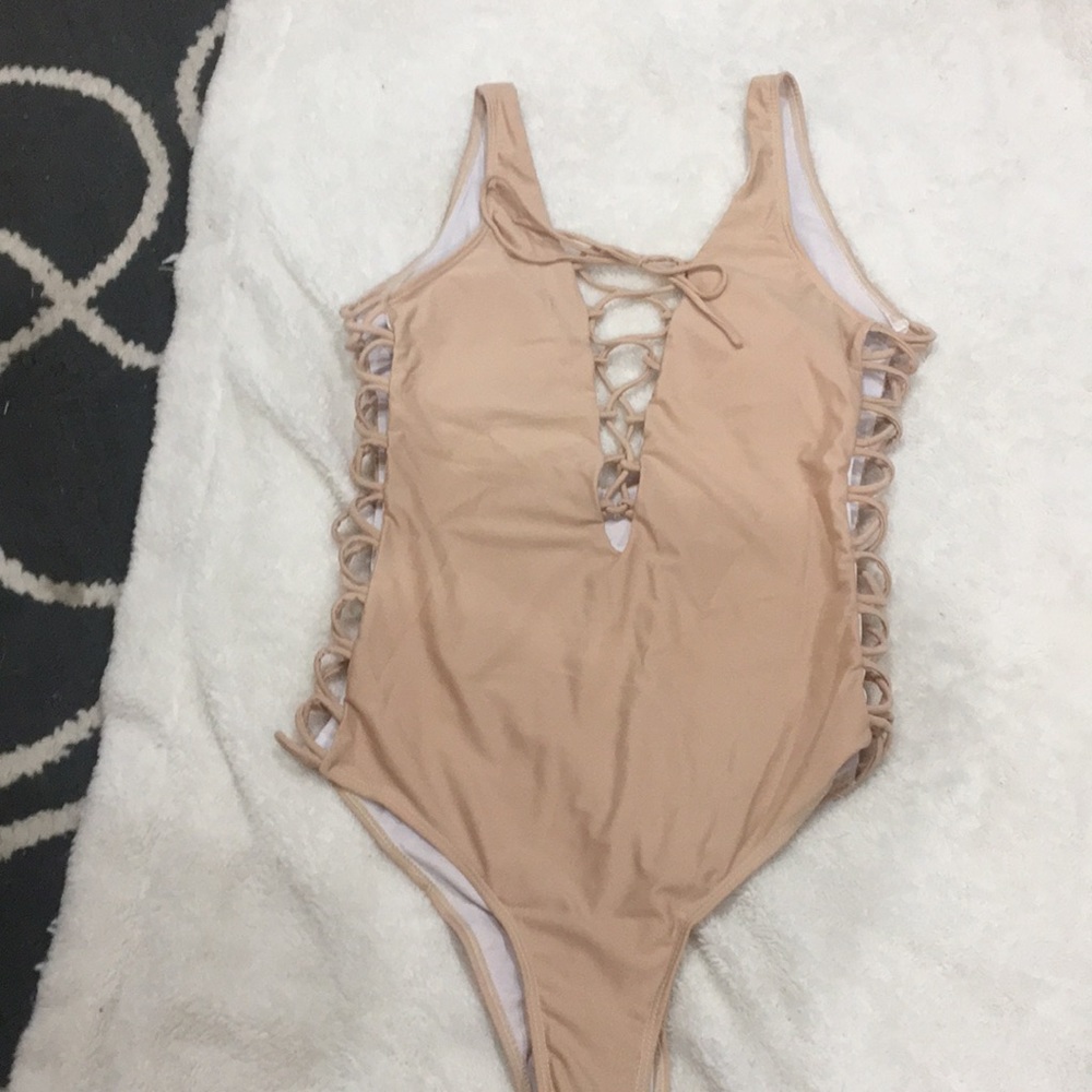 Brand new without tags tan one piece swimsuit